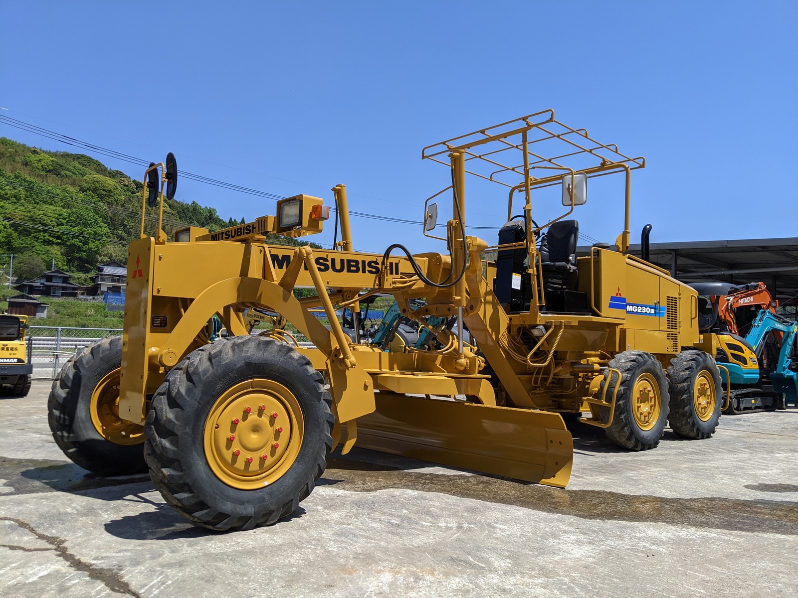 中古建設機械 中古 三菱重工業 MITSUBISHI モーターグレーダー アーティキュレート式 MG230III