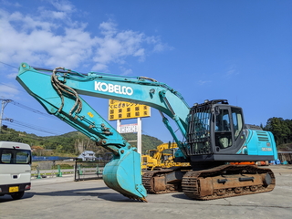 中古建設機械 中古 コベルコ建機 油圧ショベル・バックホー ０．７－０．９立米 SK210D-10 写真